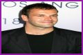 Jonny Lee Miller flashes ink for Ellen charity